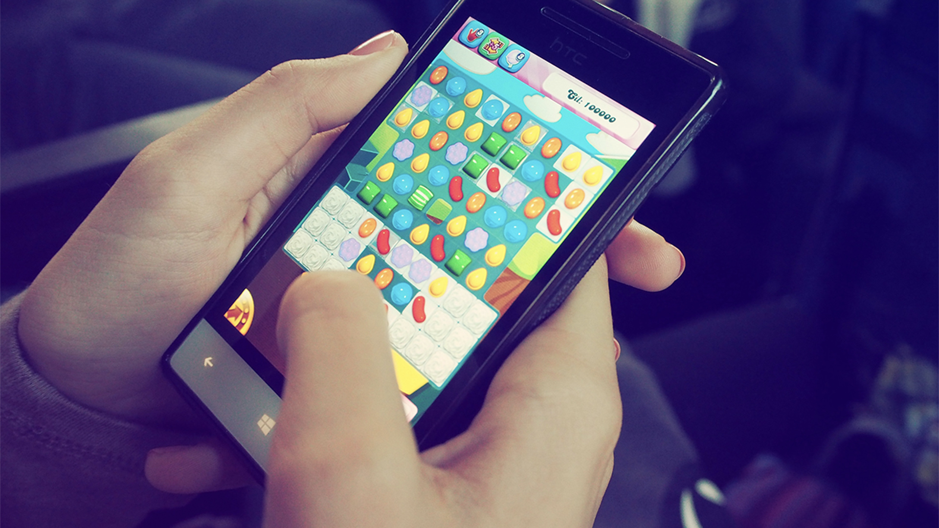 Person playing Candy Crush
