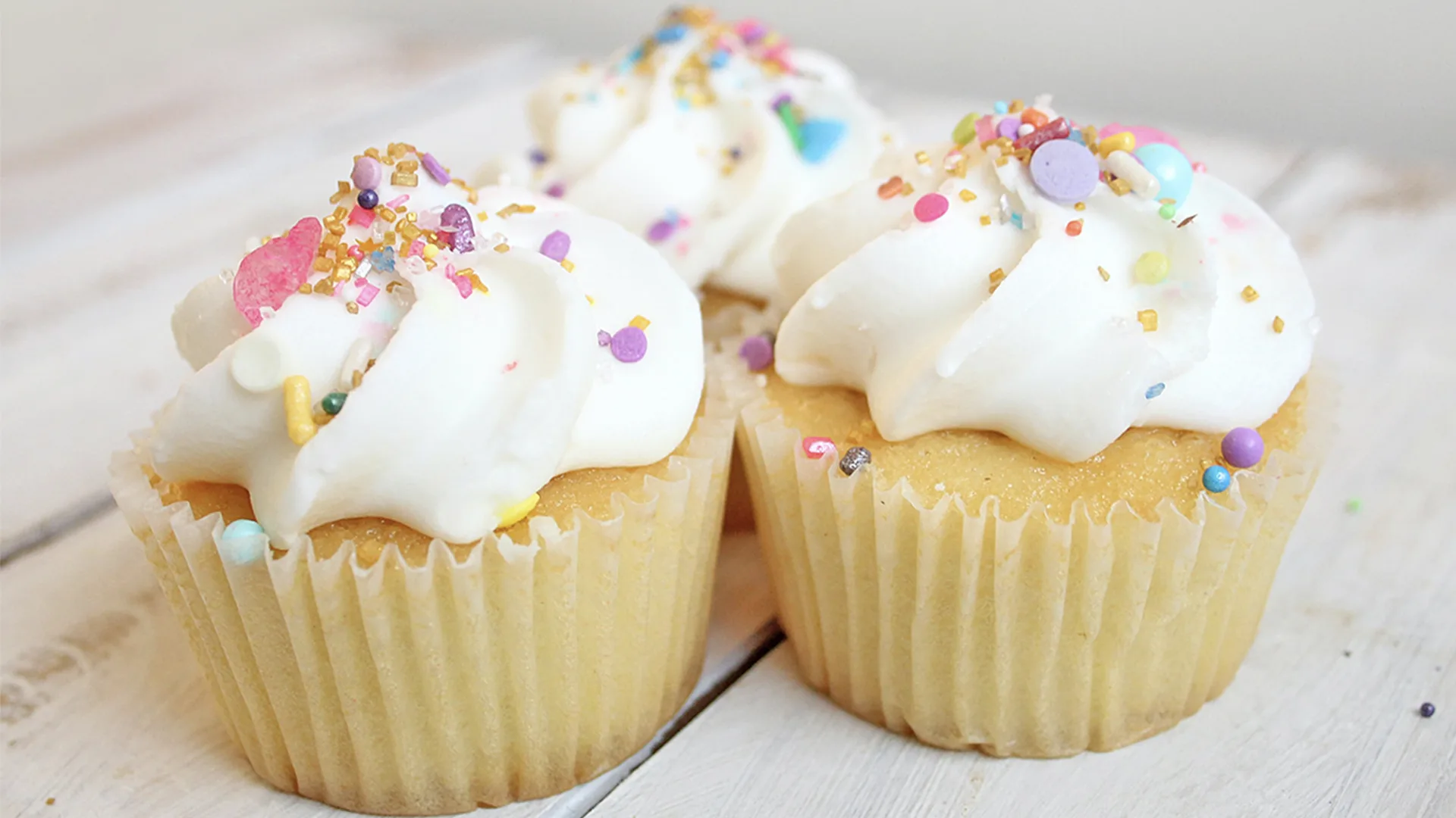 Three iced cupcakes