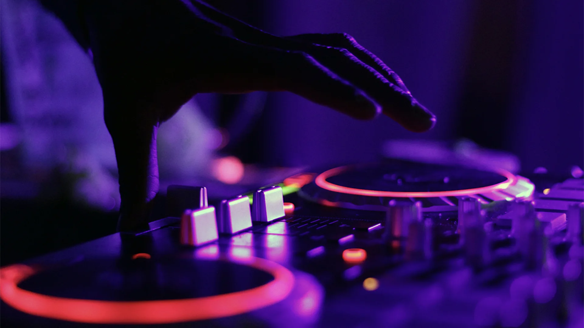 Close up of a DJ using decks