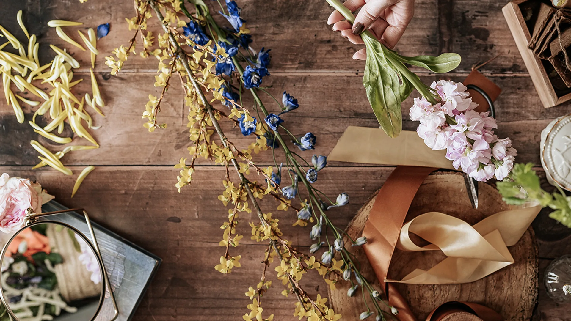 Person arranging flowers