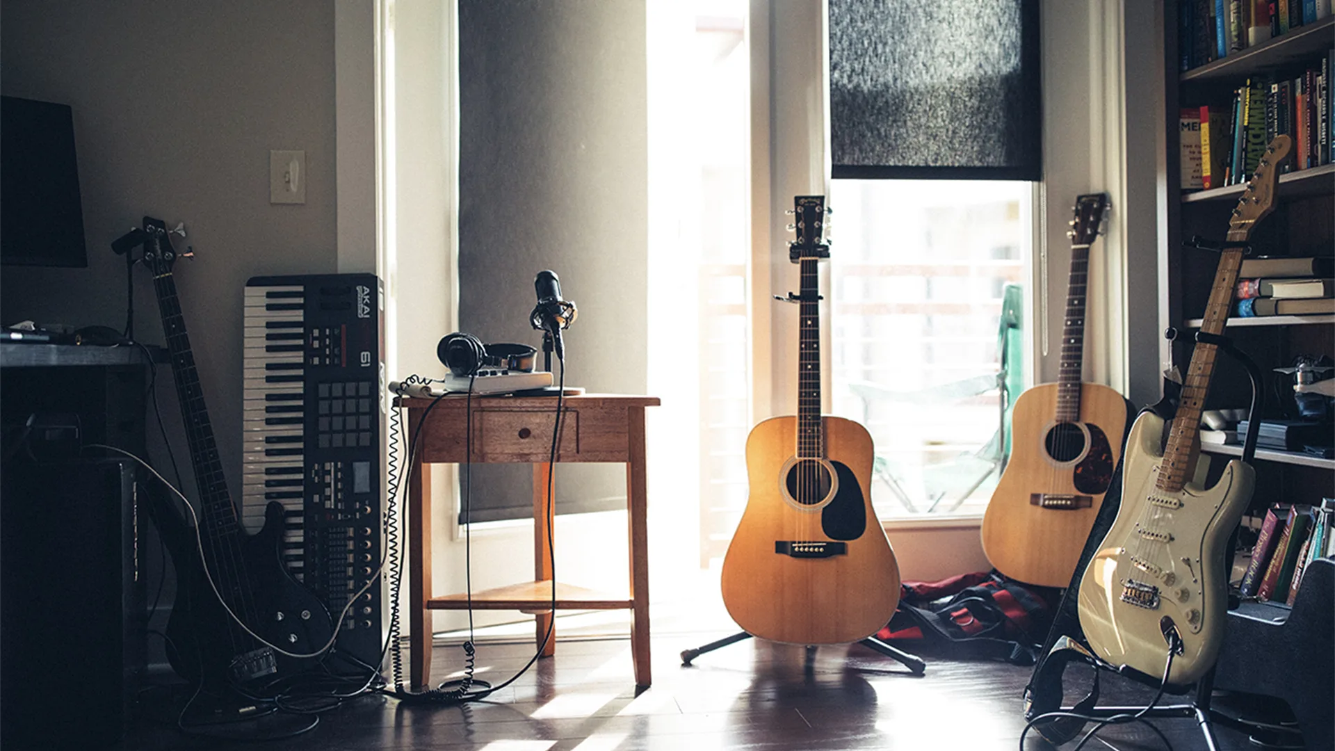 Guitars on stands in musicians room