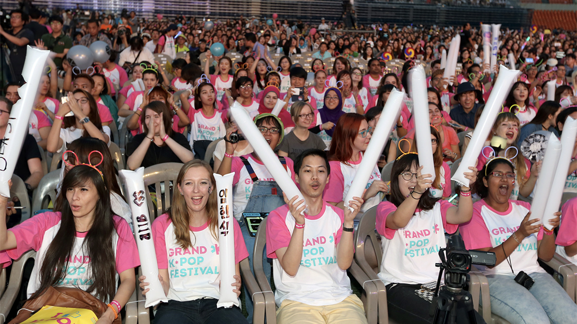 Close up of K-pop fans at a concert