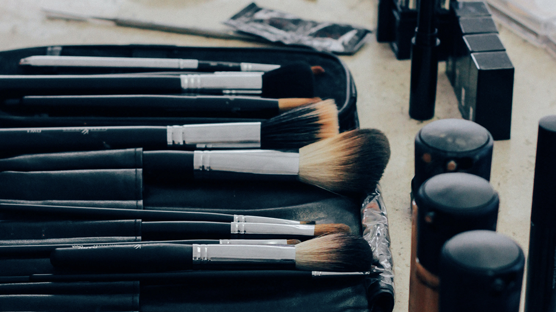 Set of makeup brushes with black handles