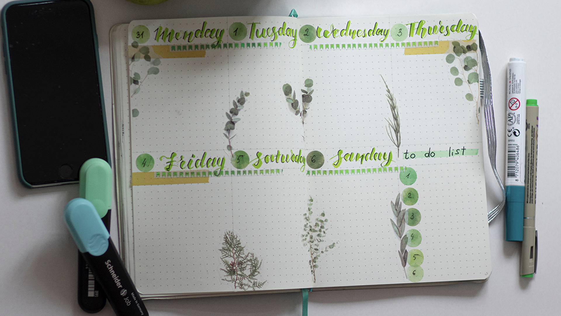 Notebook with hand drawn week planner