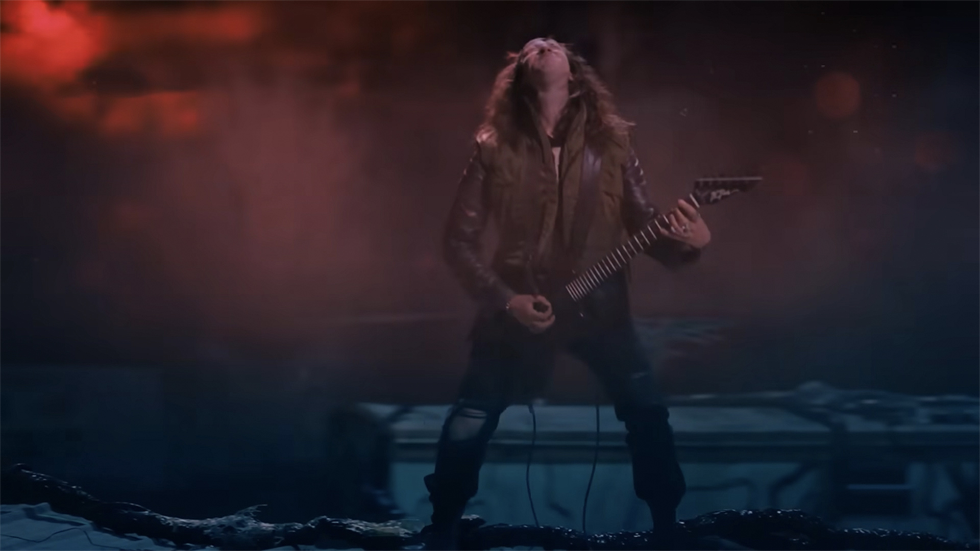 Eddie from Stranger Things playing the electric guitar