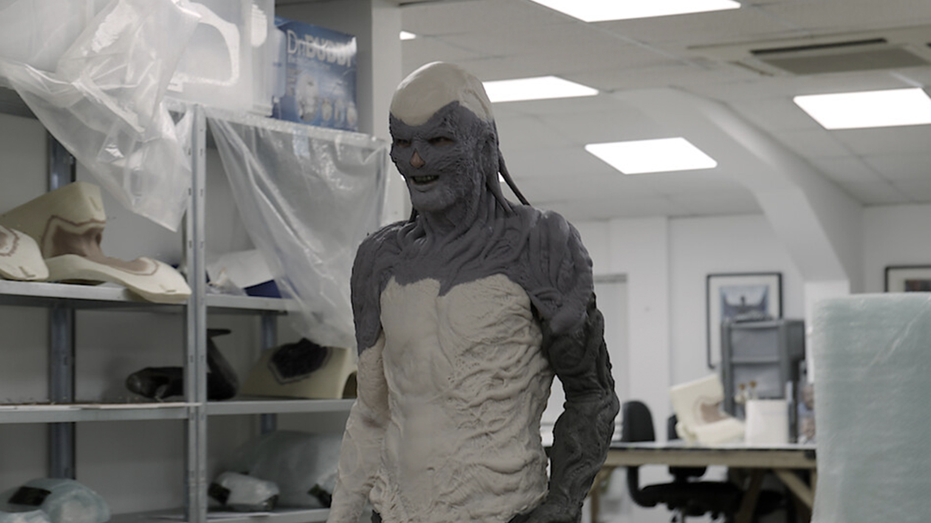 Jamie Campbell Bower having Vecna makeup applied