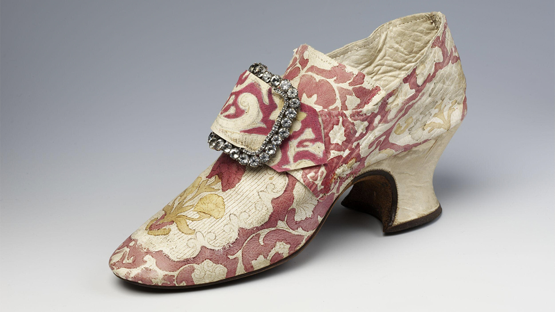 Women's shoes decorated with a painted floral design