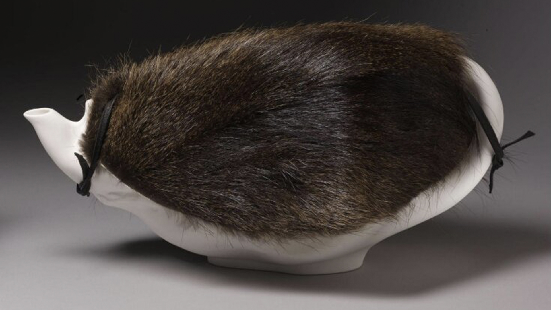 Furred covering for a ceramic object