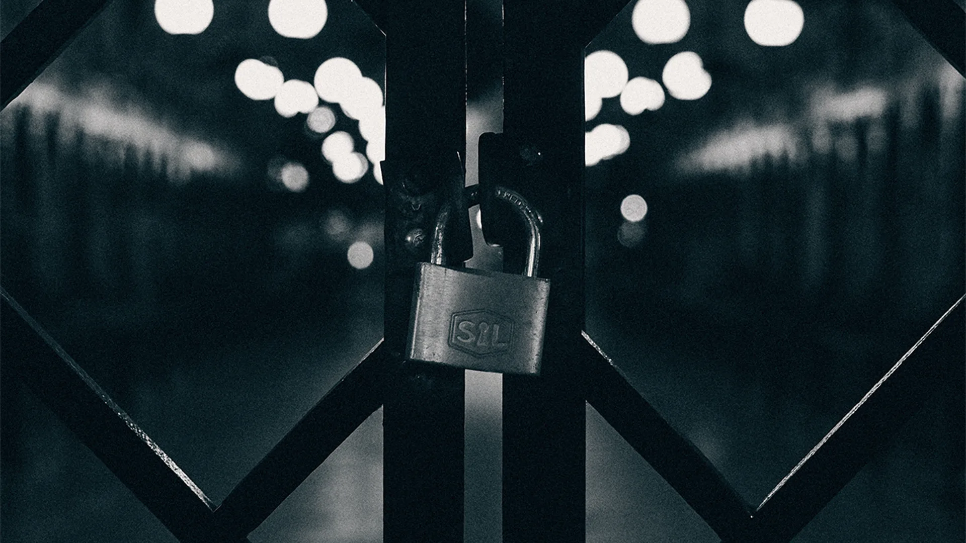 A gate with a lock on it