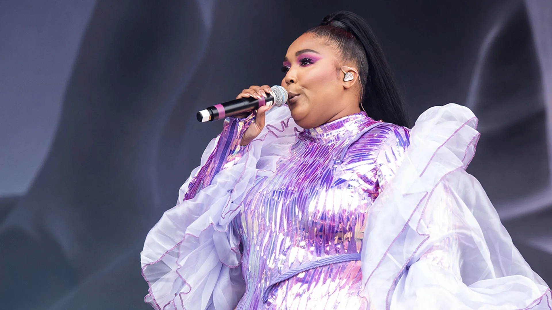 Lizzo performing on stage