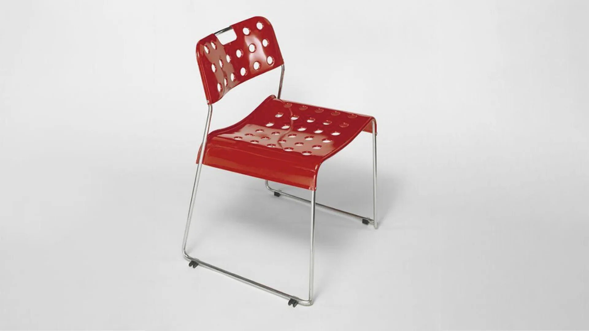 Red plastic and steel chair