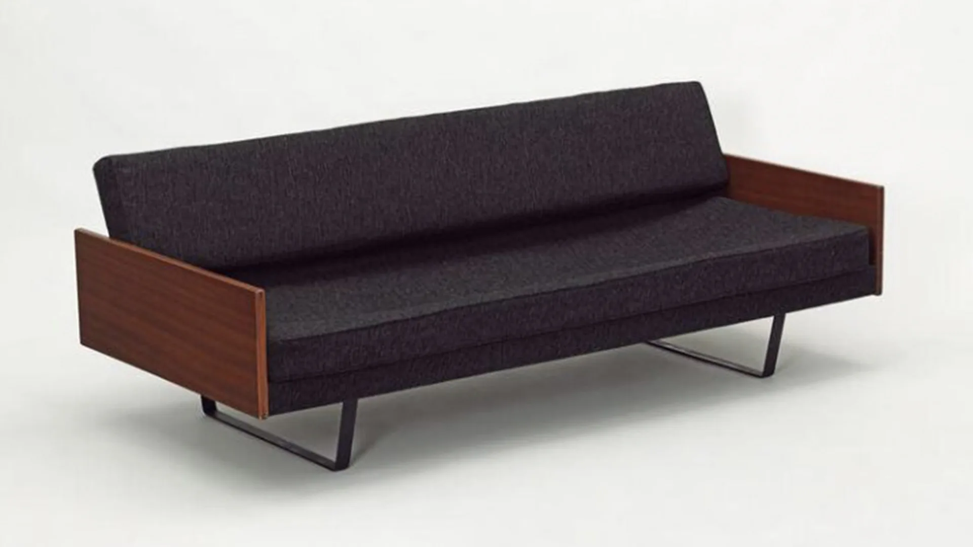 Single sofa bed with black fabric seat and wooden sides