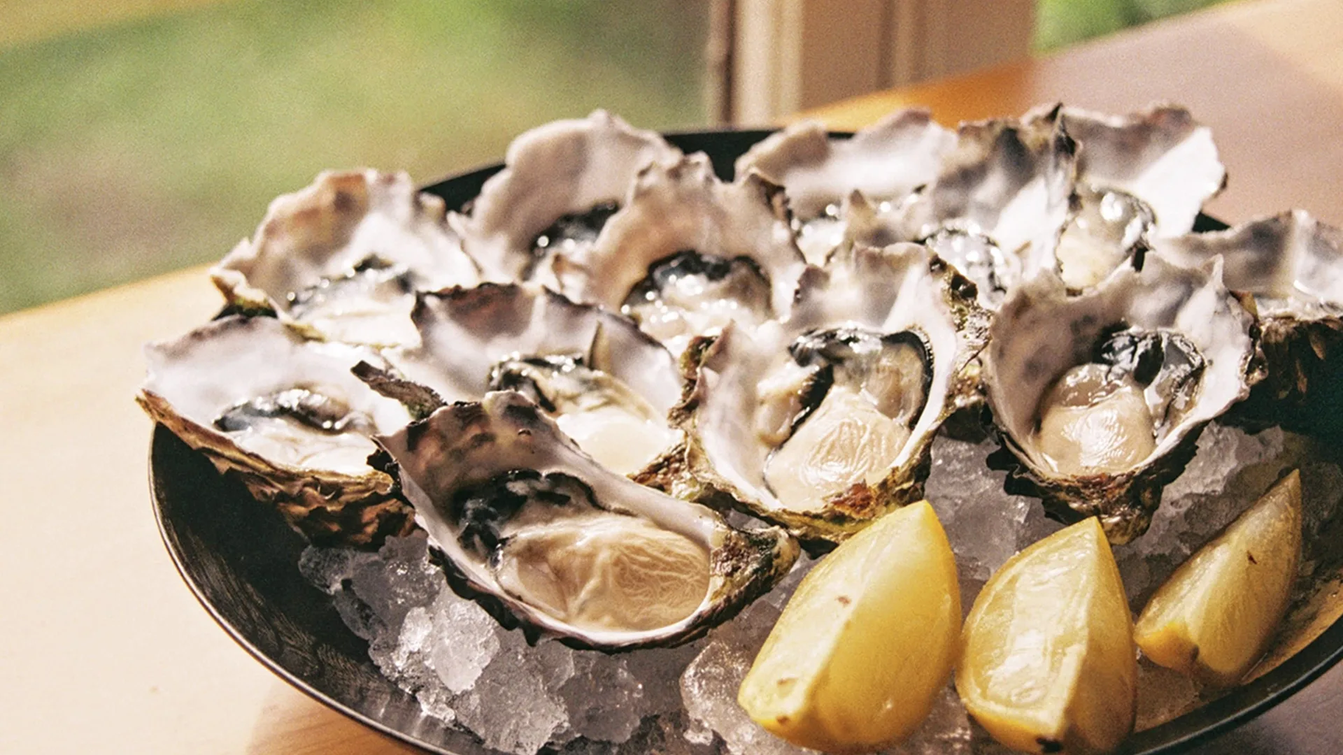 Oysters and lemon on a plate