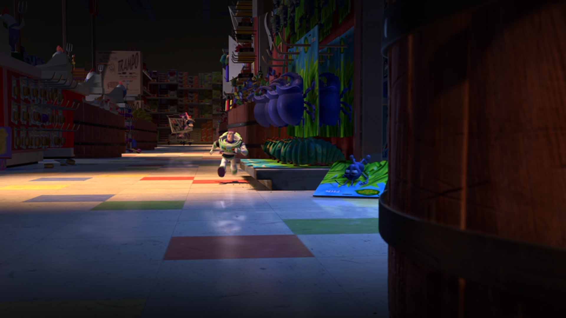 Buzz Lightyear running through a shop with Flik on the floor