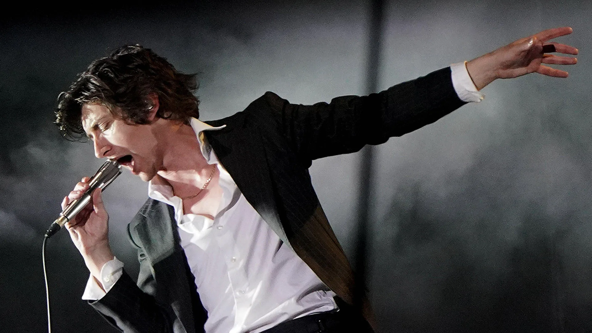Alex Turner performing at Glastonbury