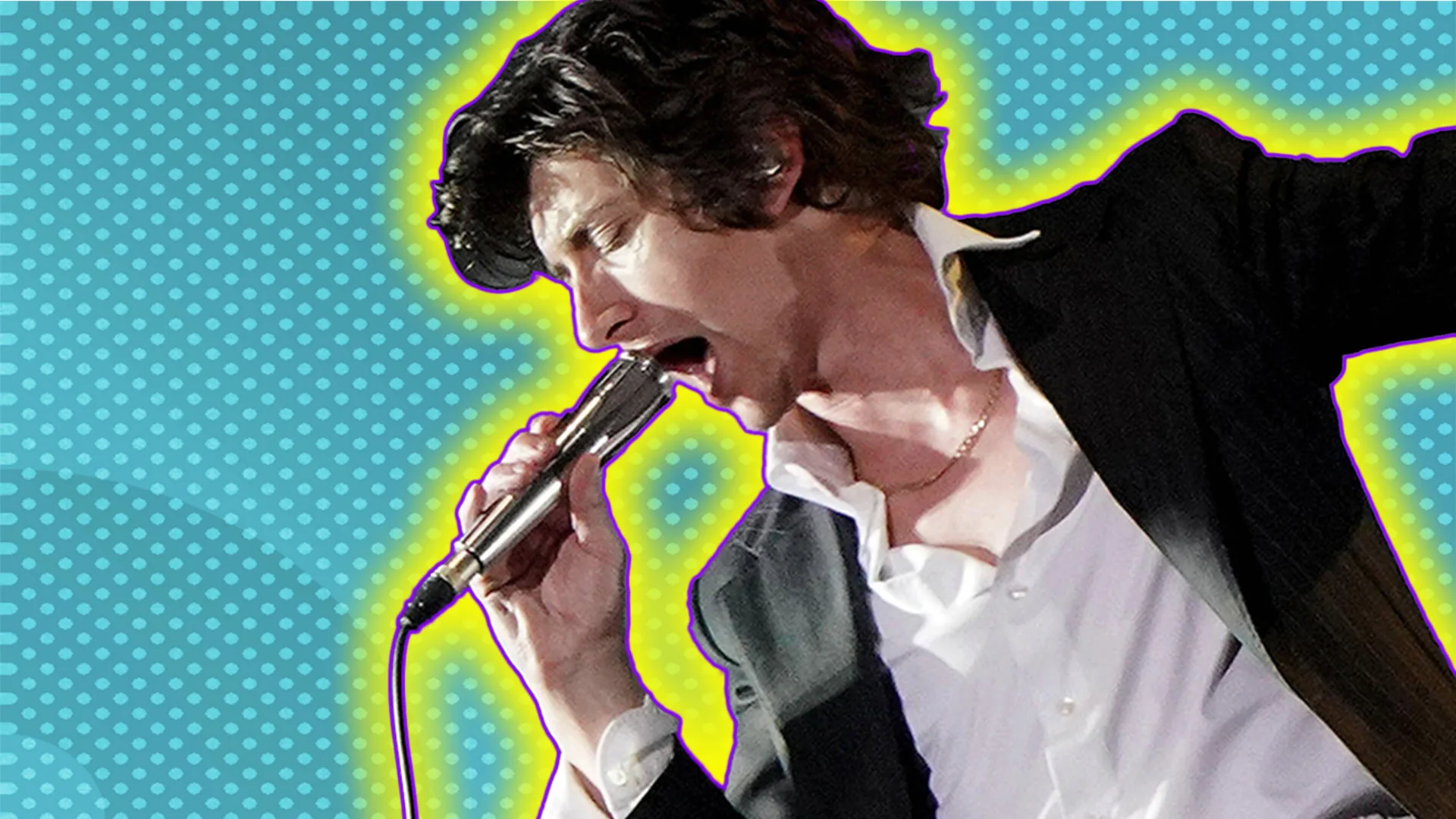 Alex Turner performing at Glastonbury on a blue background with a yellow glow