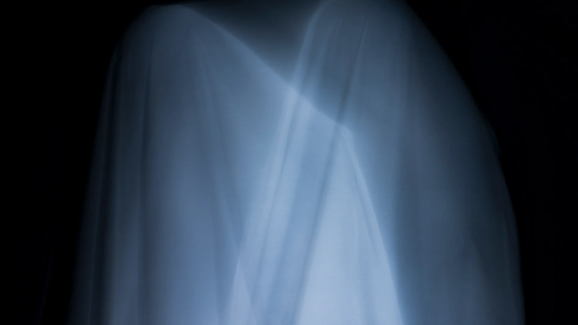 Blurry ghost like white textile