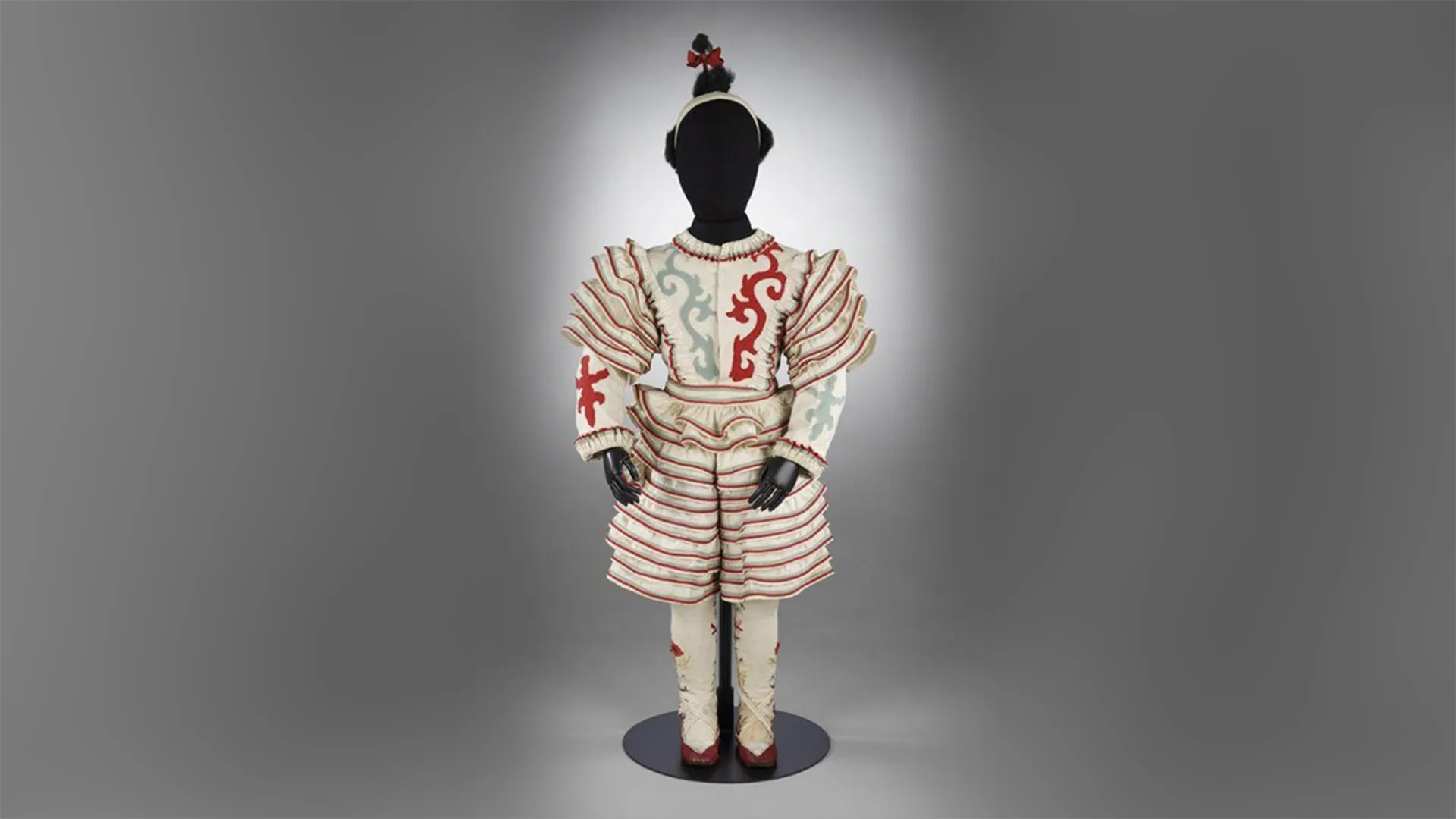Child's clown costume worn by Edward Granville Eliot