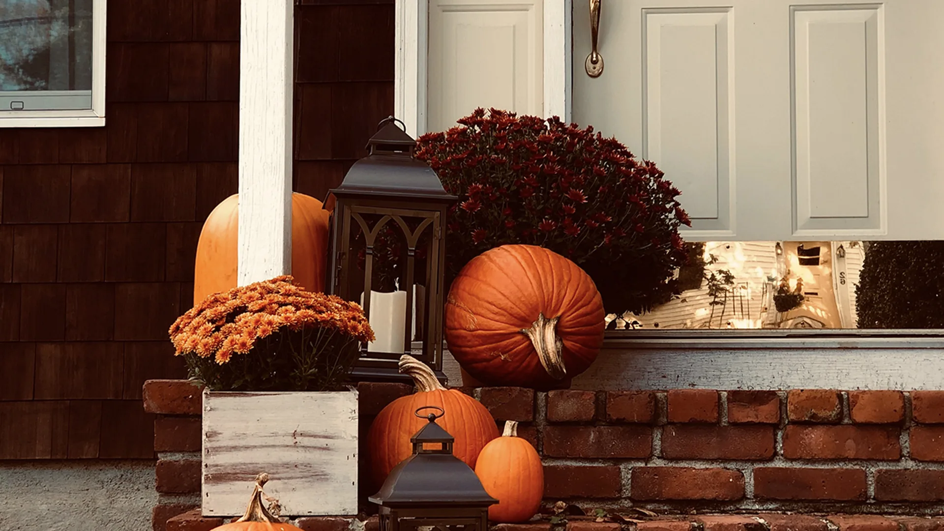 Pumpkins and decorations on the doorstep