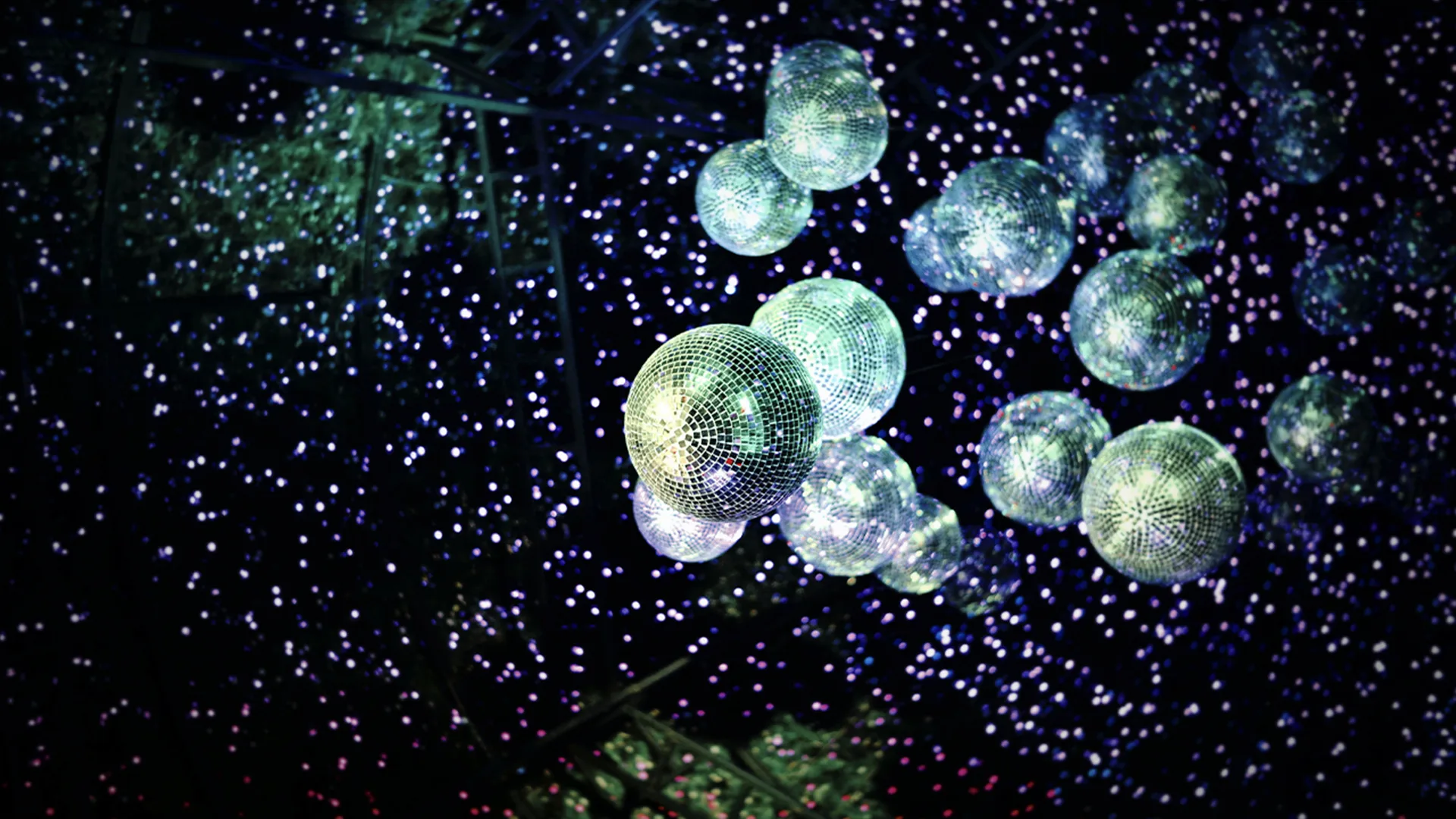 Disco balls hanging from ceiling