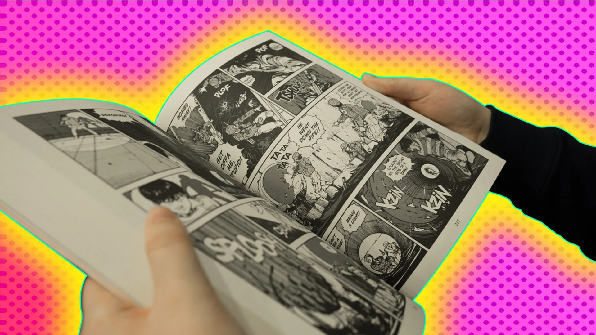 Person reading a graphic novel with a yellow glow on a pink background