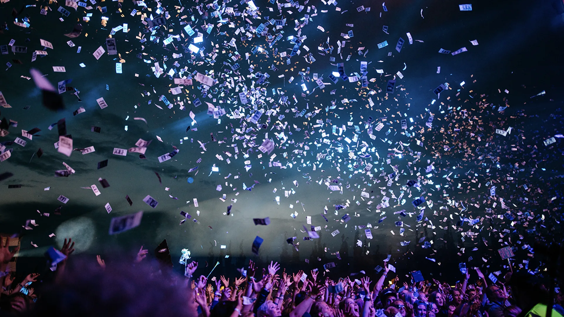 People partying outside with confetti