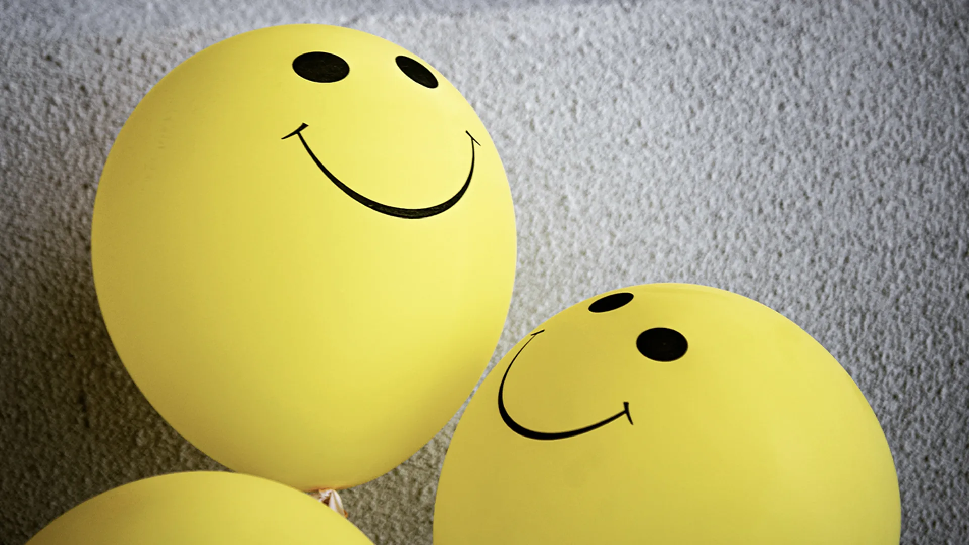 Balloons with happy faces