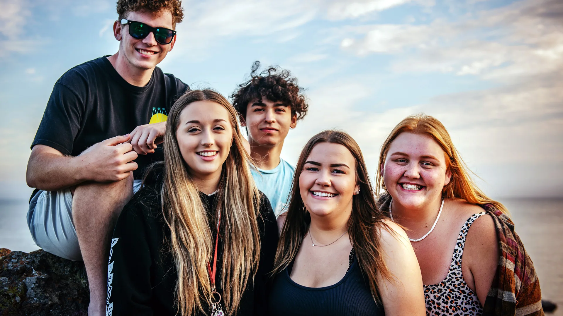 Five teenagers having fun