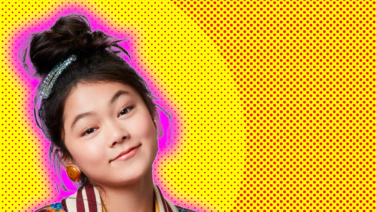 Photograph of Momona Tamada against a yellow spotted background with a pink halo